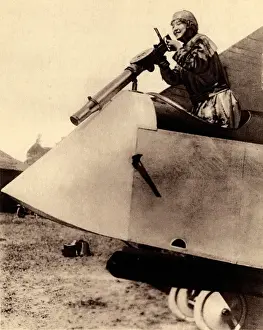 Armed Prints: WW1 - Lady aviator air-gunner demonstration in aeroplane