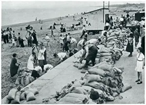 Helping Prints: WWII September 1939 Holiday makers filling sandbags
