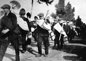 Trenches Prints: Young Belgians marching to dig shelter-trenches for the sold