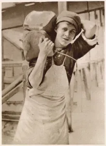 Young Prints: A young lad carrying the clay. Date: 1913